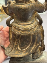 A pair of fine Chinese gilt bronze heavenly kings on stand, Ming