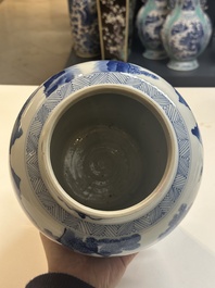 A Chinese blue and white 'Mongolian hunt' vase and cover, Kangxi