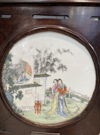 A Chinese four-fold wooden room divider with famille rose 'Romance of the Western Chamber' plaques, Republic