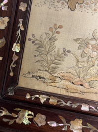 A Chinese mother-of-pearl-inlaid wooden table screen with silk embroidery, Canton, 19th C.
