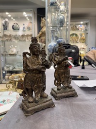 A pair of fine Chinese gilt bronze heavenly kings on stand, Ming