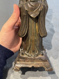 A Chinese bronze figure of an official, Ming