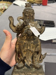 A pair of fine Chinese gilt bronze heavenly kings on stand, Ming