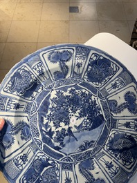 A large Chinese blue and white 'kraak' dish with birds among flowering branches, Wanli