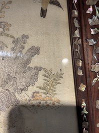 A Chinese mother-of-pearl-inlaid wooden table screen with silk embroidery, Canton, 19th C.
