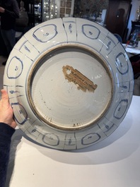 A large Chinese blue and white 'kraak' dish with birds among flowering branches, Wanli