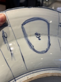 A large Chinese blue and white 'kraak' dish with birds among flowering branches, Wanli