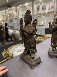 A pair of fine Chinese gilt bronze heavenly kings on stand, Ming