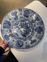 A large Chinese blue and white 'kraak' dish with birds among flowering branches, Wanli