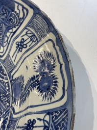 A large Chinese blue and white 'kraak' dish with birds among flowering branches, Wanli