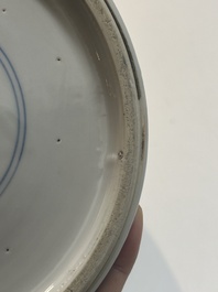 A Chinese blue and white 'Mongolian hunt' vase and cover, Kangxi