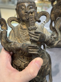 A pair of fine Chinese gilt bronze heavenly kings on stand, Ming