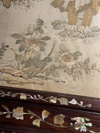 A Chinese mother-of-pearl-inlaid wooden table screen with silk embroidery, Canton, 19th C.