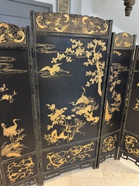 A Chinese gilt-lacquered wooden five-panel folding screen with birds and dragons, 19th C.