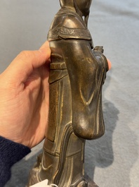 A Chinese bronze figure of an official, Ming