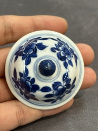 A pair of Chinese blue and white 'Long Eliza' vases and covers, jade mark, Kangxi