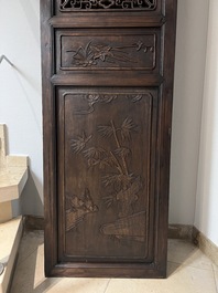 Four Chinese carved and openworked wooden doors, early 20th C.