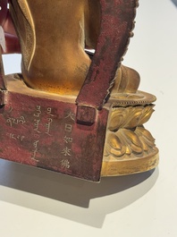A fine Chinese gilt bronze Buddha, Qianlong mark and of the period