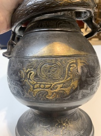 A Chinese archaistic bronze gold-splashed 'dragon' vase, Dong 東 mark, Ming