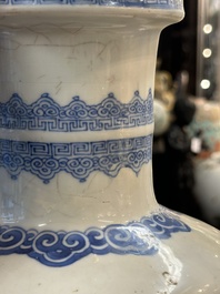 A Chinese blue and white 'phoenix and peony scroll' rouleau vase, Kangxi