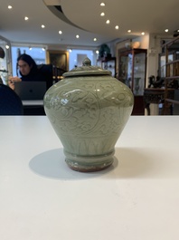 Two Chinese Longquan celadon jars with floral design, Ming