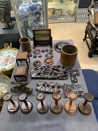 A large collection of 103 Chinese wooden stands, covers and other wood works, 19/20th C.
