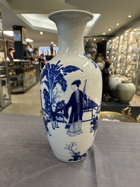 A Chinese blue and white vase with ladies and playing boys in a garden, 19th C.