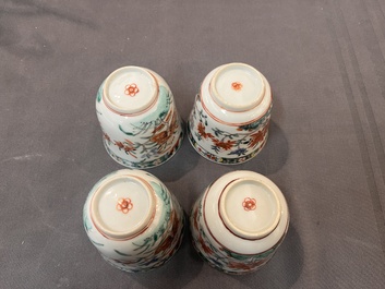 A set of 12 Chinese famille verte cups and saucers with floral design, Kangxi