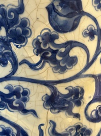 A Chinese blue and white 'phoenix and peony scroll' rouleau vase, Kangxi