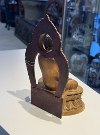 A fine Chinese gilt bronze Buddha, Qianlong mark and of the period