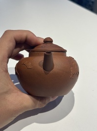 Three Chinese Yixing stoneware teapots and covers, 18th C.