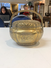 A Chinese bronze 'landscape' handwarmer, Qiu Fuxi 丘福禧 mark, 19th C.