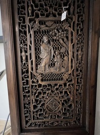 Four Chinese carved and openworked wooden doors, early 20th C.