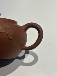 Three Chinese Yixing stoneware teapots and covers, 18th C.