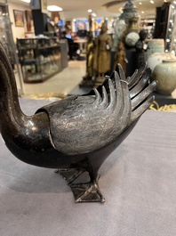 A Chinese bronze duck-form incense burner, Ming