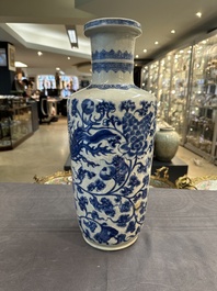 A Chinese blue and white 'phoenix and peony scroll' rouleau vase, Kangxi