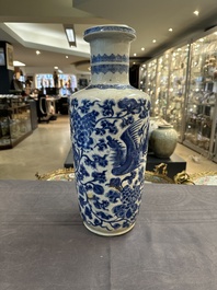 A Chinese blue and white 'phoenix and peony scroll' rouleau vase, Kangxi
