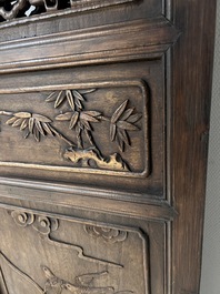 Four Chinese carved and openworked wooden doors, early 20th C.
