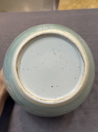 A Chinese celadon-glazed 'dragon' jar with reticulated wooden cover and stand, Qianlong