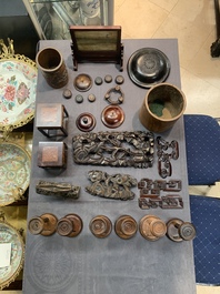 A large collection of 103 Chinese wooden stands, covers and other wood works, 19/20th C.