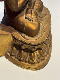 A fine Chinese gilt bronze Buddha, Qianlong mark and of the period