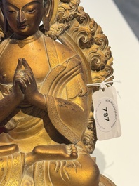 A fine Chinese gilt bronze Buddha, Qianlong mark and of the period