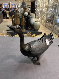 A Chinese bronze duck-form incense burner, Ming