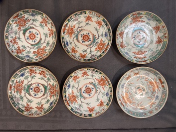 A set of 12 Chinese famille verte cups and saucers with floral design, Kangxi