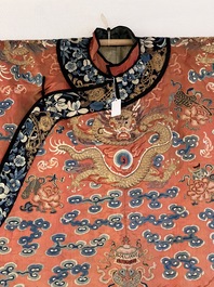 A fine Chinese gold thread embroidered red-ground silk noble lady&rsquo;s 'dragon' robe, 18/19th C.
