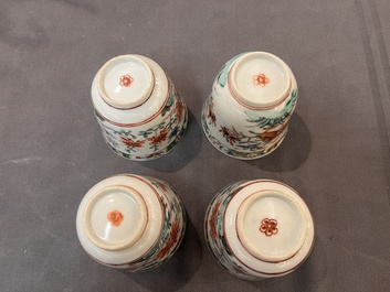 A set of 12 Chinese famille verte cups and saucers with floral design, Kangxi