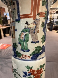 A pair of Chinese wucai 'gu' vases with narrative design, Transitional period