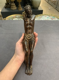 Two carved wooden Corpi Christi and a figure of a monk, Spain and Goa, 16th C.