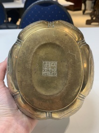 A Chinese bronze 'landscape' handwarmer, Qiu Fuxi 丘福禧 mark, 19th C.