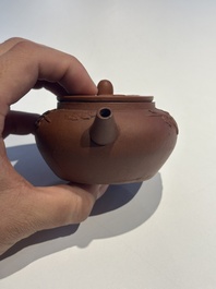 Three Chinese Yixing stoneware teapots and covers, 18th C.